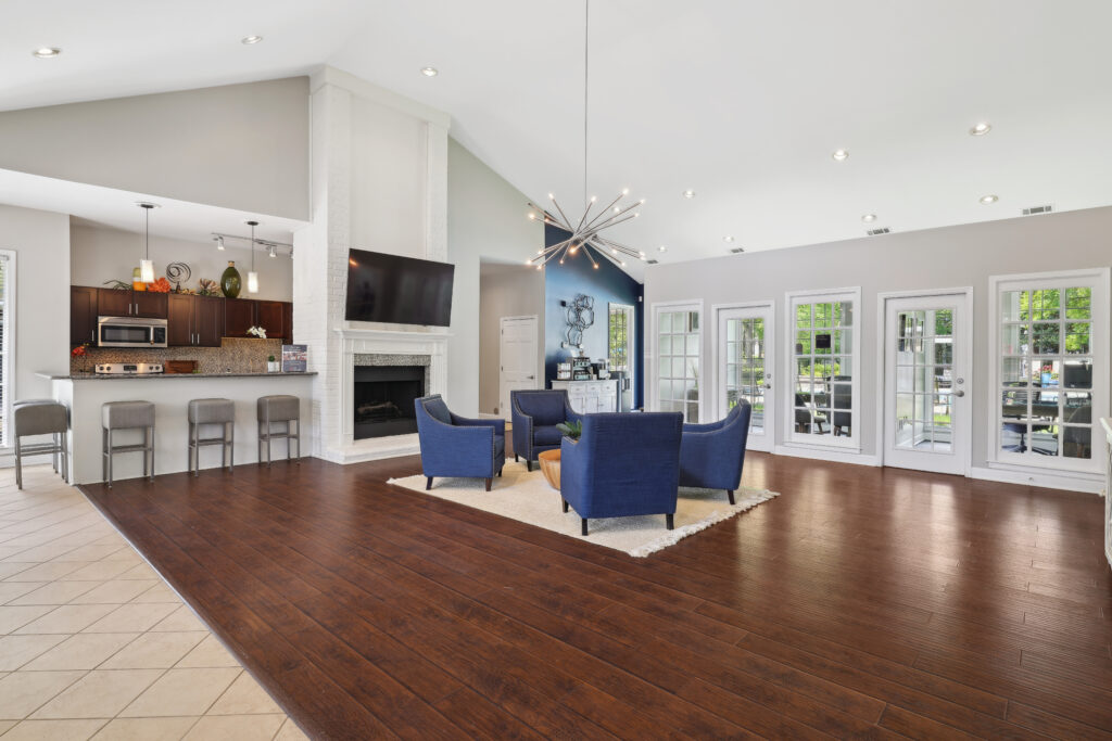 Photo of the apartment clubhouse with 4 chairs in the room